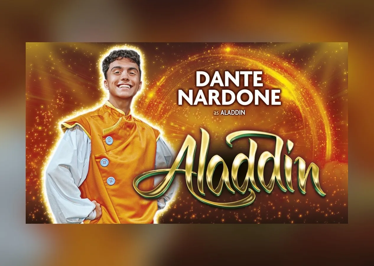 Dante Nardone smiling in an orange and white costume in artwork for the Bournemouth Pavilion pantomime