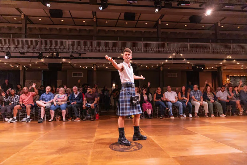 Scott Gilmour as Ramsay in a tartan kilt on the dancefloor in the North American premiere of Ceilidh