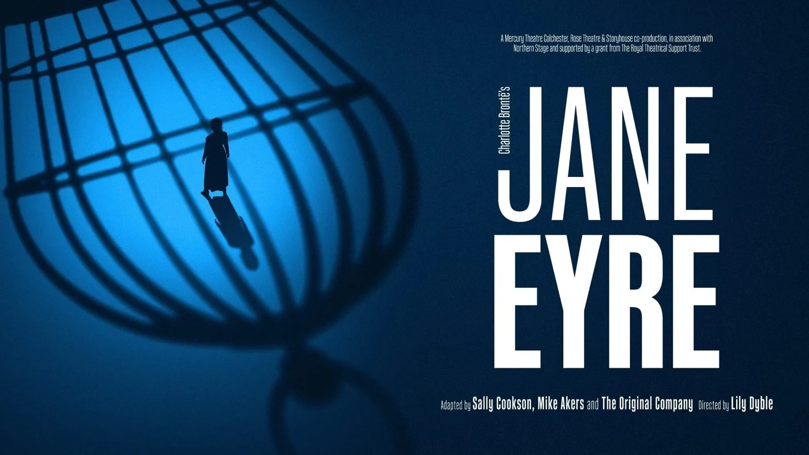 Jane Eyre key art for the Storyhouse, Mercury Theatre and Rose Theatre co-production, showing a small silhouette of Jane standing inside the shadow of a giant birdcage on a deep blue background