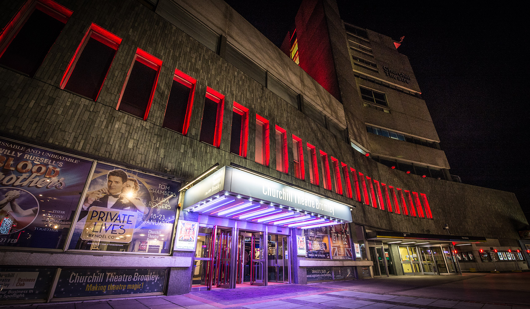 Box office entrance of the Churchill Theatre on Bromley High Street at night